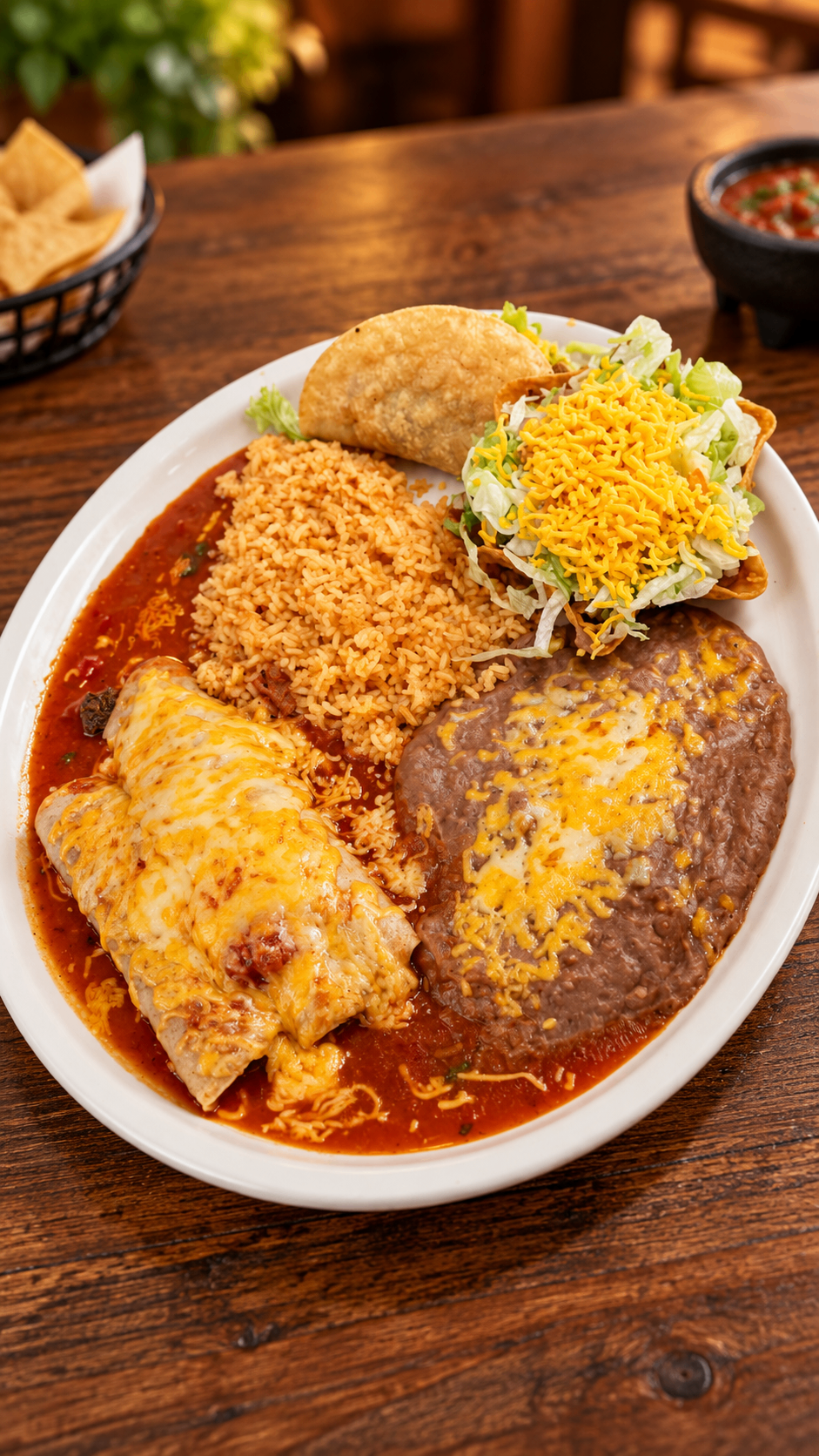 Cheesy enchiladas with rice, beans, and a crispy taco at El Torito Mexican Grill